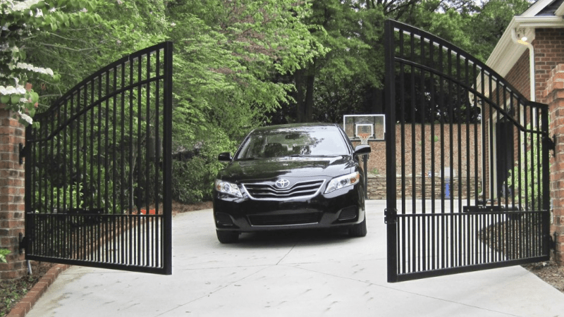 Automatic Gates with black car